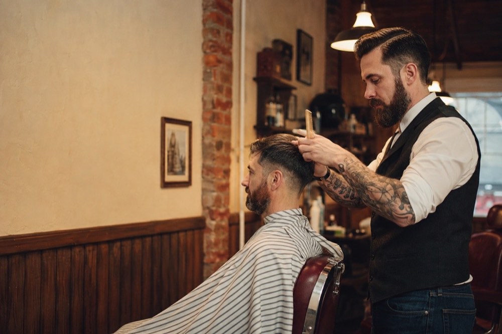 Fictional barbershop website direction for Fifth Chair Barber Co.